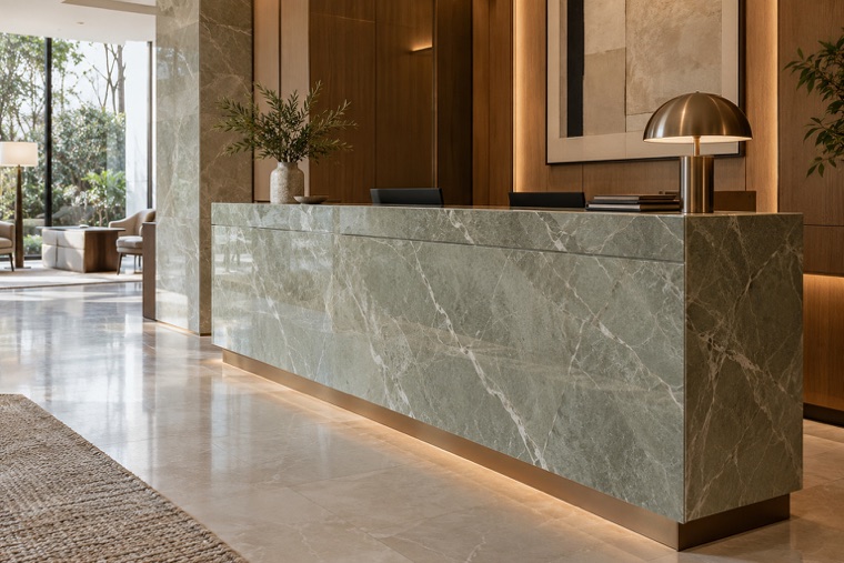Reception counter in green marble-look porcelain slab