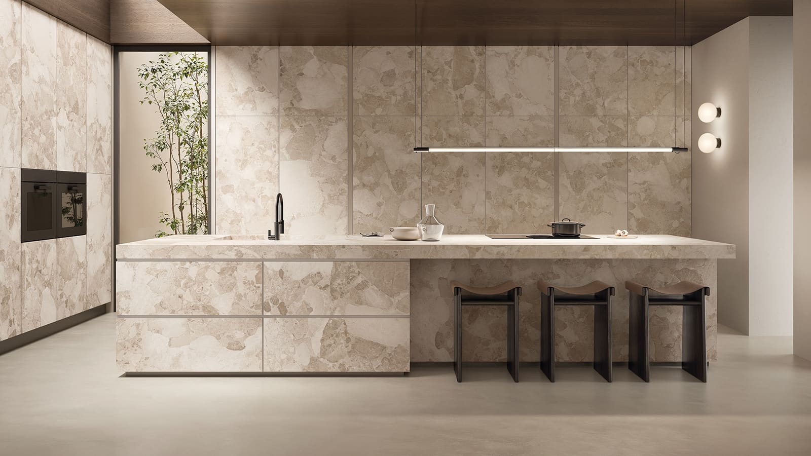 Custom kitchen with a bookmatched porcelain slab island and full-height backsplash